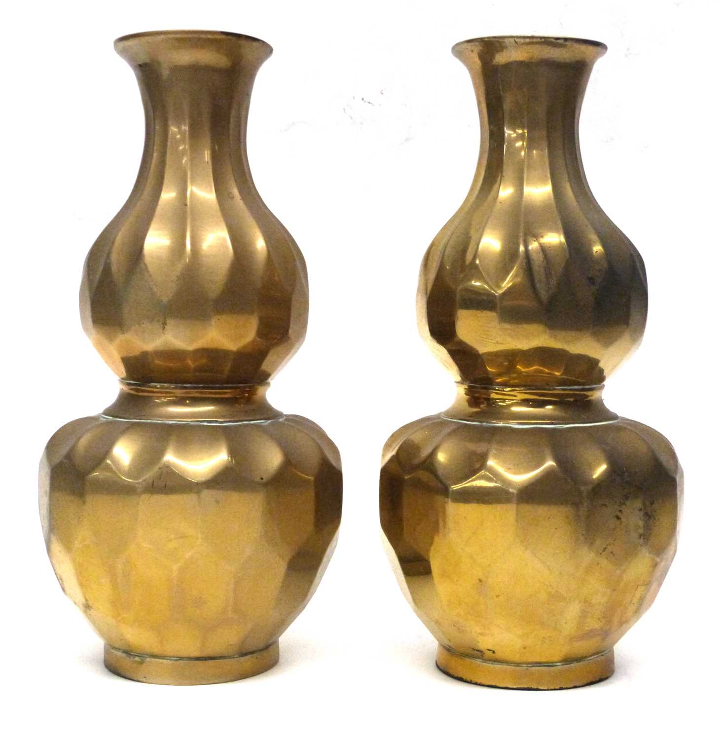 Lot 9 - A pair of Chinese brass vases of gours shape...