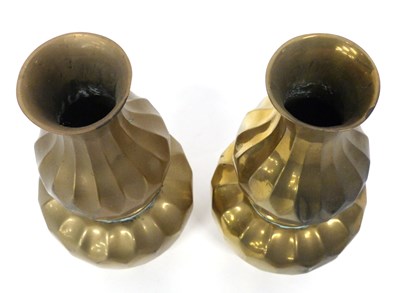 Lot 9 - A pair of Chinese brass vases of gours shape...