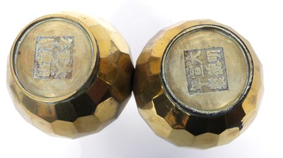 Lot 9 - A pair of Chinese brass vases of gours shape...