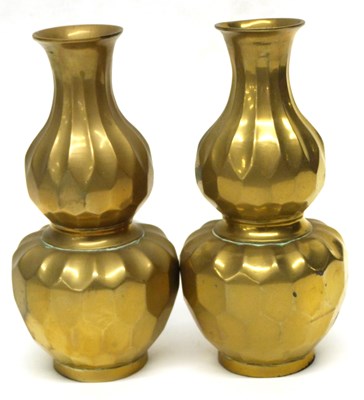 Lot 9 - A pair of Chinese brass vases of gours shape...