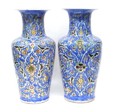 Lot 39 - Pair of Persion Iznik vases, blue ground with...