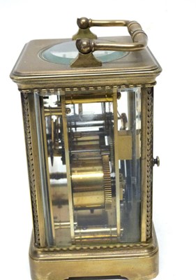 Lot 75 - Brass carriage clock with white enamal dial,...