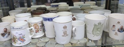 Lot 103 - Quantity of commemorative mugs and beakers,...