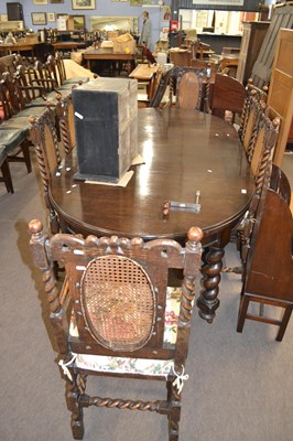 Lot 644 - Early 20th Century oval oak extending dining...