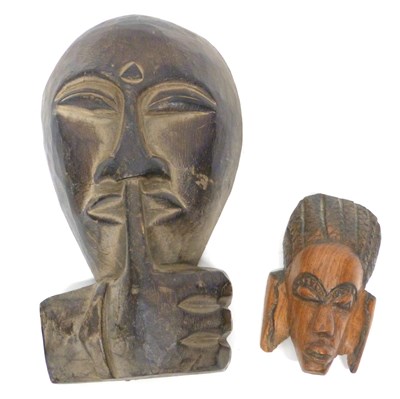 Lot 180 - Two African carvings of heads