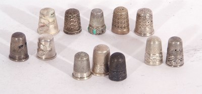 Lot 107 - Group of nine hallmarked silver thimbles and...