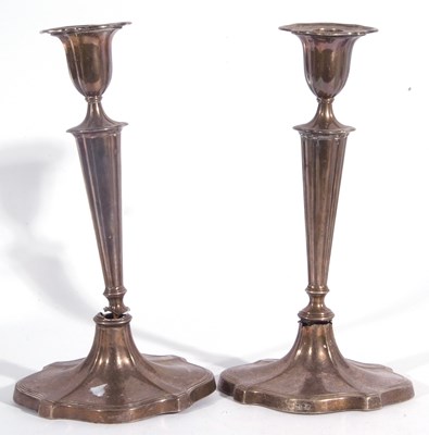 Lot 167 - A pair of Edward VII silver candlesticks with...