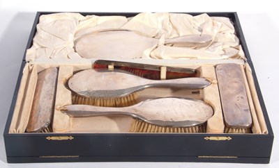 Lot 168 - A cased dressing table set, comprising hand...