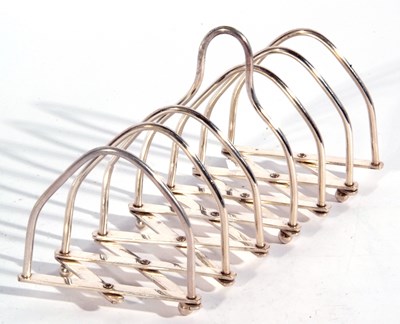 Lot 176 - Unusual expanding silver plated toast rack...