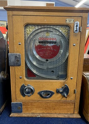 Lot 306 - Allwin Deluxe slot machine set in a light oak...