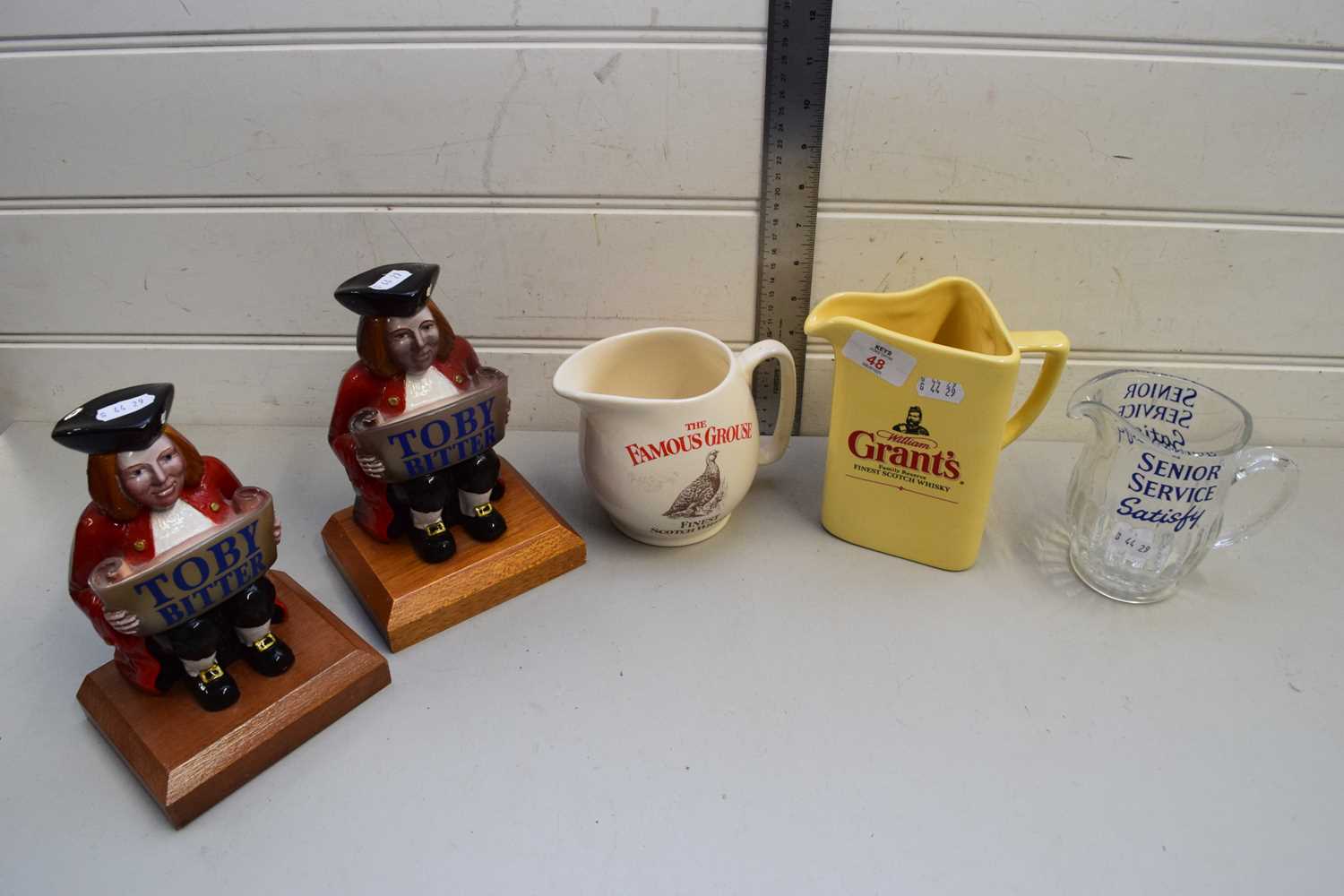 Lot 48 - PAIR OF TOBY BITTER BEER TAP ORNAMENTS...
