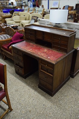Lot 321 - LATE VICTORIAN OAK DESK WITH EIGHT DRAWERS AND...