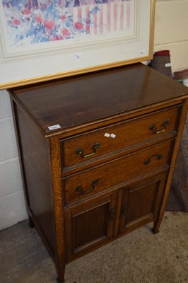 Lot 382 - EARLY 20TH CENTURY OAK TWO DRAWER TWO DOOR...