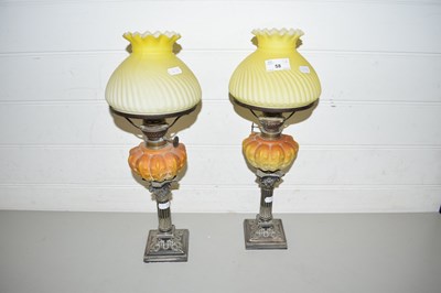 Lot 58 - UNUSUAL PAIR OF SMALL OIL LAMPS WITH SILVER...