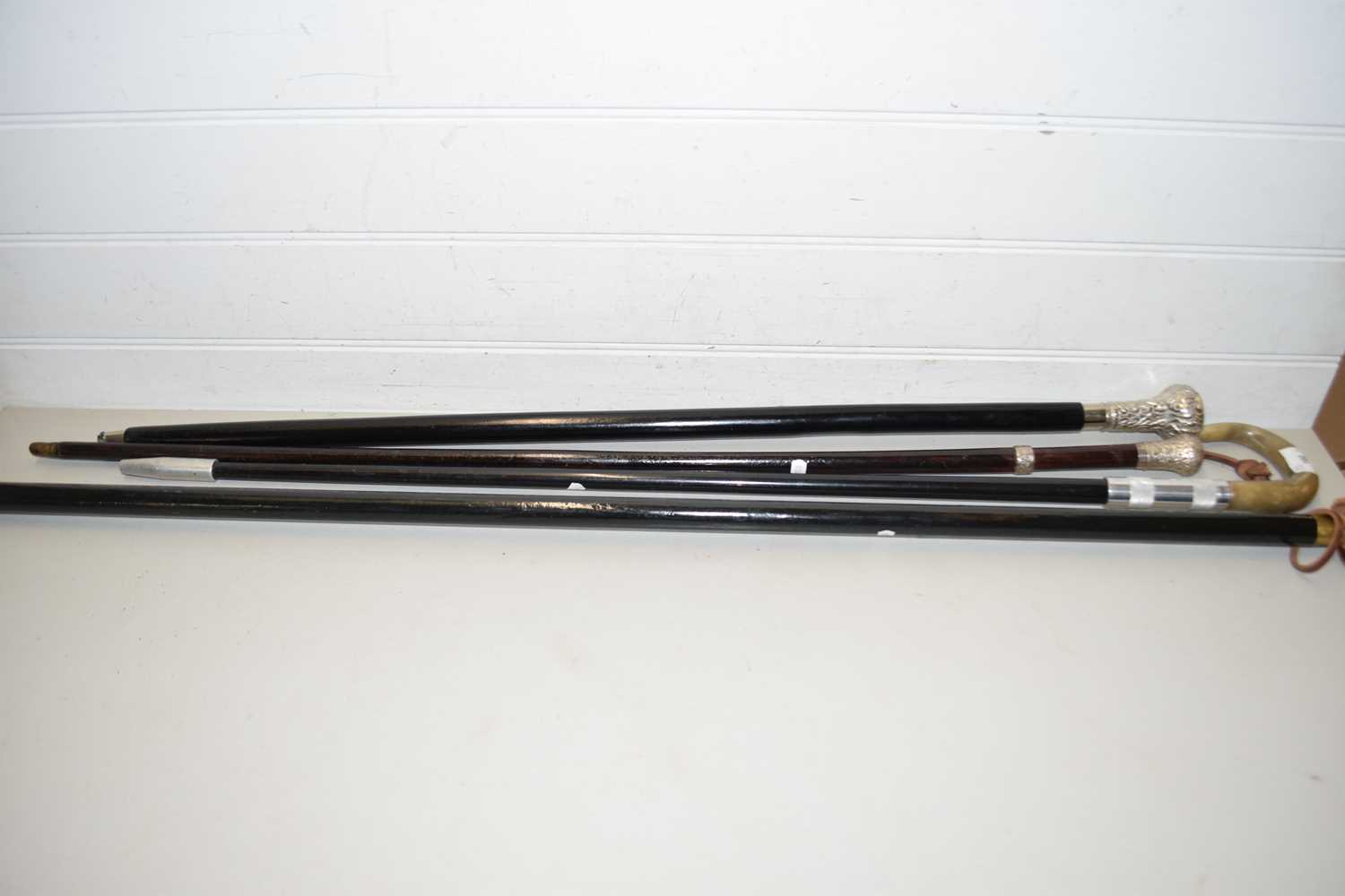 Lot 160 - FOUR VARIOUS WALKING STICKS TO INCLUDE WHITE...