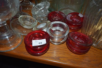 Lot 69 - 13 mixed tea light candle holders