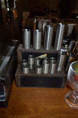 Lot 71 - Schweppes stainless steel thimble bar measures...