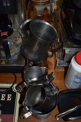 Lot 85 - 7 stainless steel milk jugs