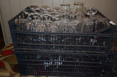 Lot 107 - 2 crates of mixed branded pint glasses to...