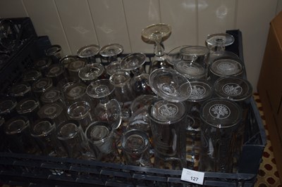 Lot 127 - Crate of mixed glass ware to include branded...