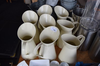 Lot 193 - Vintage tin milk jugs