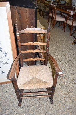 Lot 238 - RUSH SEATED LADDER BACK ROCKING CHAIR