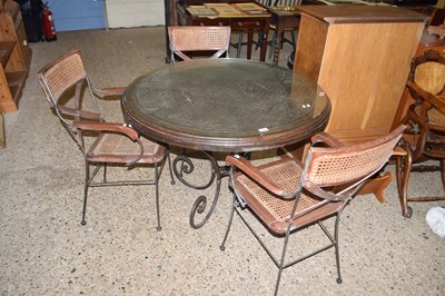 Lot 267 - IRON FRAMED AND GLASS TOPPED DINING TABLE...