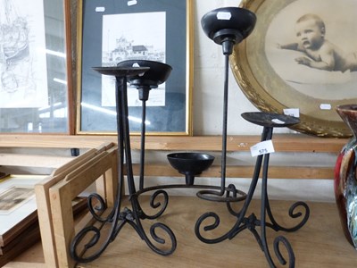 Lot 575 - THREE VARIOUS IRON CANDLE HOLDERS