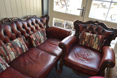 Lot 236 - Leather three seater sofa together with an...