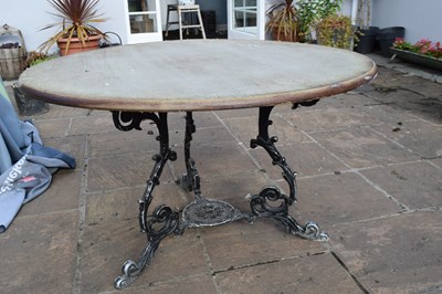 Lot 332 - Circular beer garden table with cast iron base,...