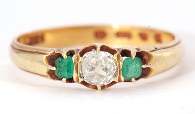 Lot 2 - 18ct gold diamond and emerald ring centering...