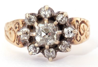 Lot 11 - Diamond cluster ring centering an old cushion...