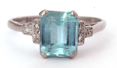 Lot 18 - Aquamarine and diamond ring, a stepped cut...