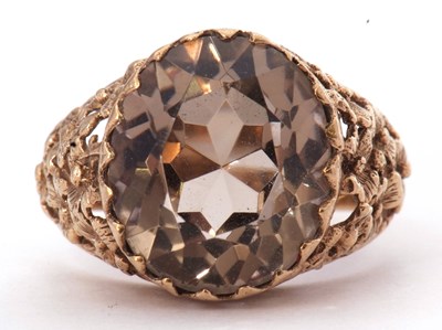 Lot 24 - 9ct gold quartz dress ring the oval faceted...