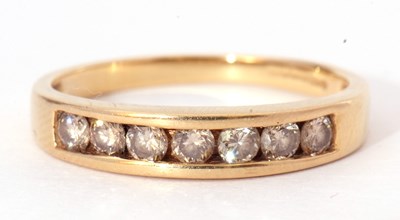 Lot 27 - 18ct gold diamond half hoop ring featuring...