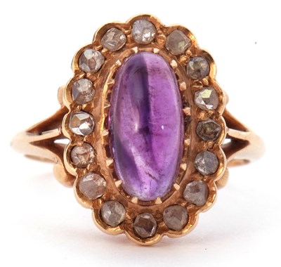 Lot 33 - Amethyst and diamond cluster ring centering an...