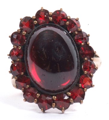 Lot 58 - Bohemian style garnet cluster ring, the...