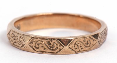 Lot 77 - 9ct gold ring, the faceted band engraved with...