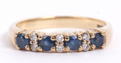 Lot 80 - 9ct gold sapphire and diamond ring featuring...