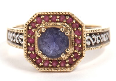 Lot 83 - Modern 9ct gold blue and red stone dress ring,...