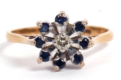 Lot 91 - Sapphire and diamond flower head ring...