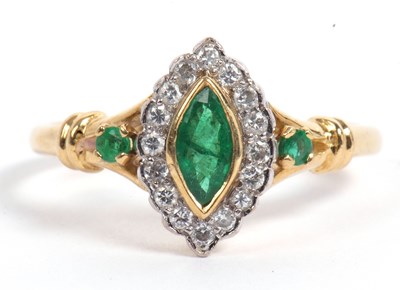 Lot 104 - 18ct gold emerald and diamond ring centering a...