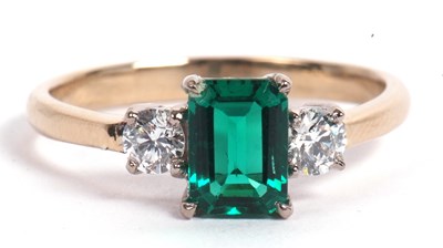 Lot 105 - Green stone and diamond ring the central step...