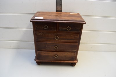 Lot 81 - SMALL HARDWOOD FIVE DRAWER TABLE TOP CHEST
