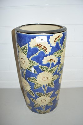 Lot 63 - POTTERY UMBRELLA STAND WITH FLORAL DESIGN