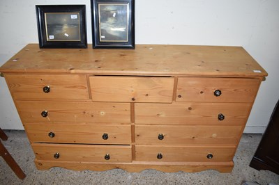 Lot 246 - WAXED PINE NINE DRAWER LONG CHEST, LENGTH...