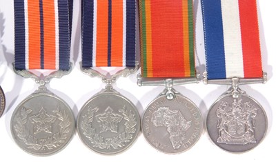 Lot 291 - Four South African medals including unnamed...