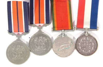 Lot 291 - Four South African medals including unnamed...