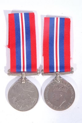 Lot 121 - Two named South African 1939-45 medals to J W...