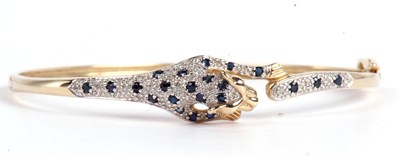 Lot 194 - Modern 9ct gold panther hinged bracelet, the...